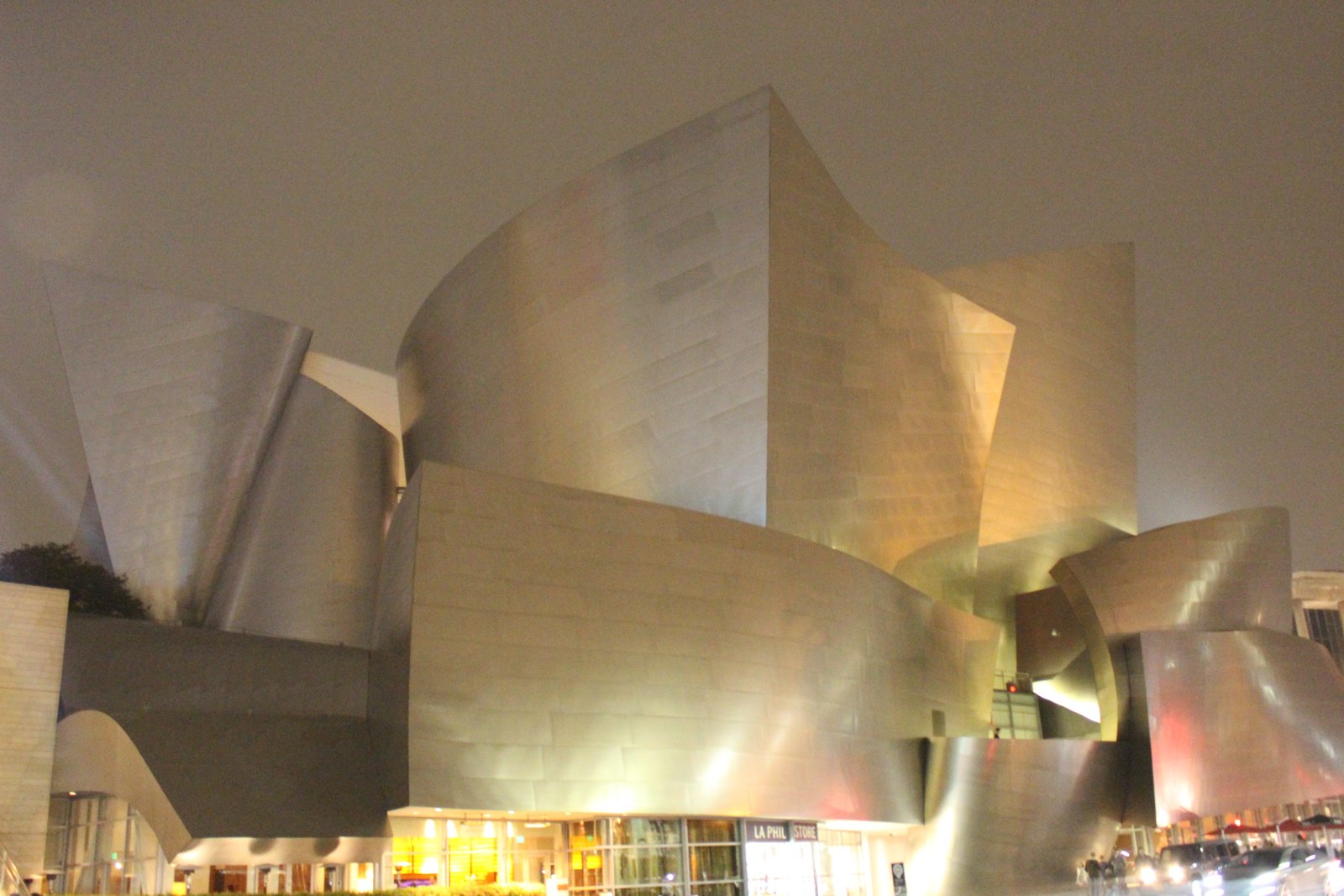 Curving metallic exterior of Walt Disney Concert Hall at night