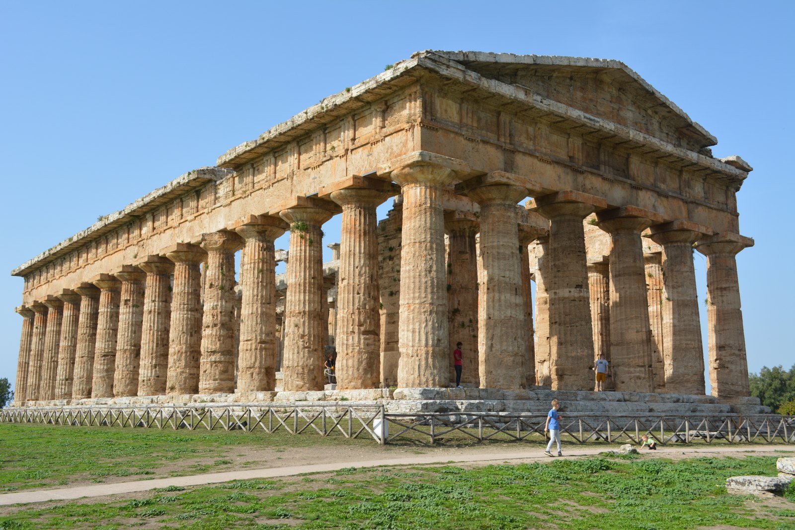 Ancient stone temple with repeated classical columns